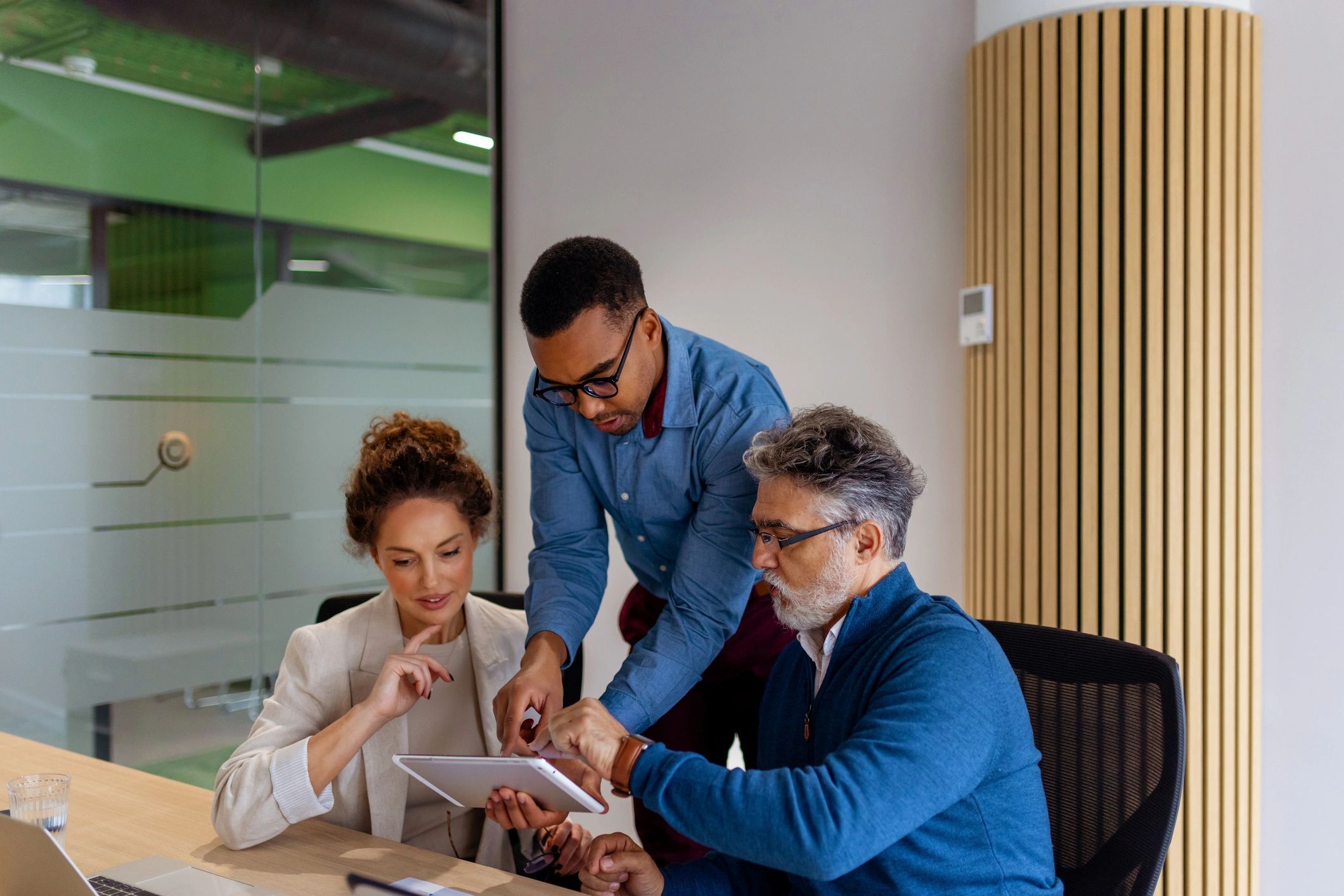 Marketing team collaborating in a modern office